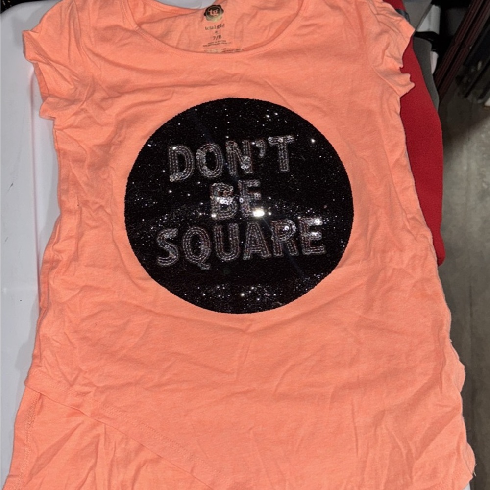 Orange Tee with Black Sequin Design